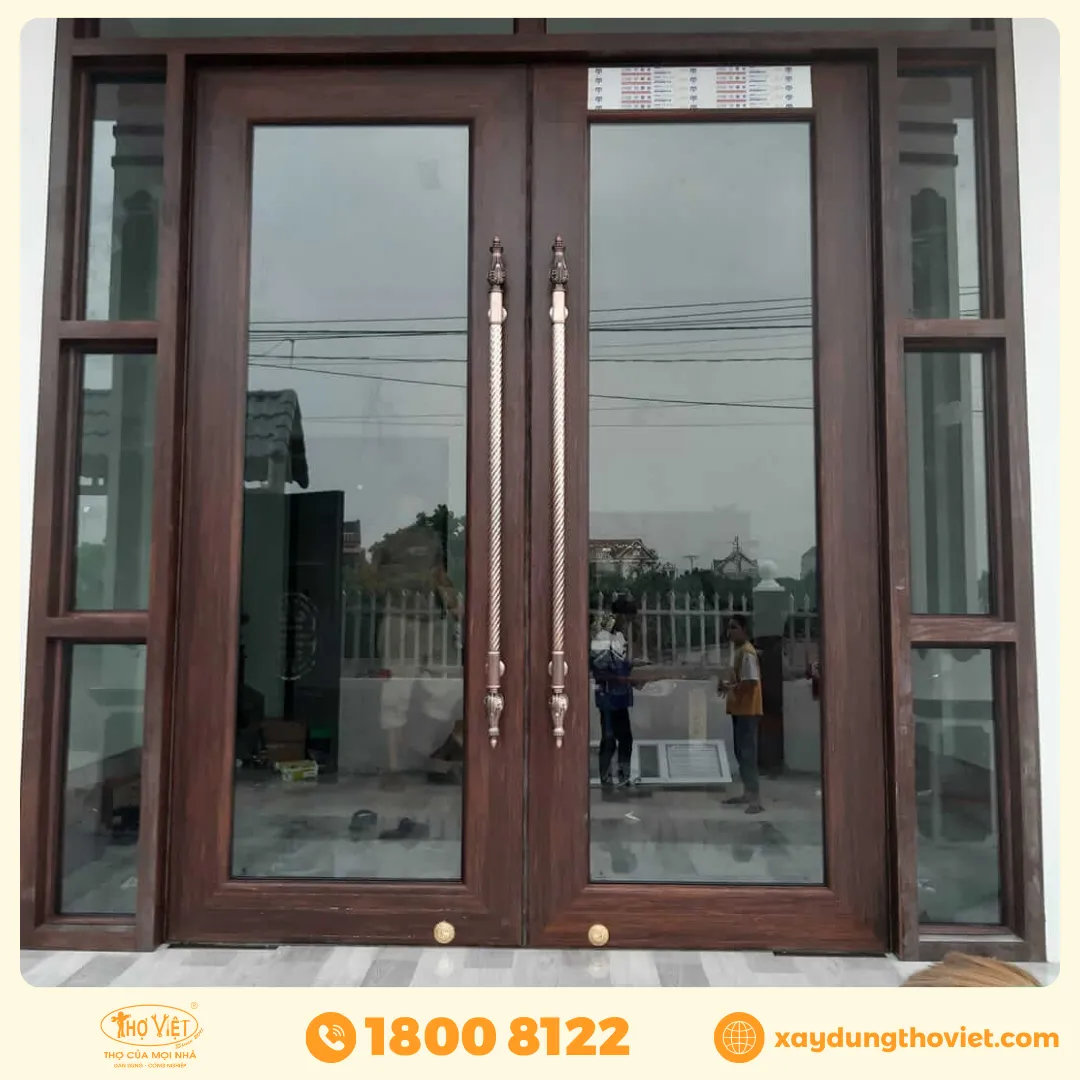 cửa nhôm thủy lực màu vân gỗ